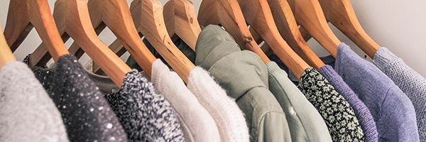 Clothes hanging in the wardrobe